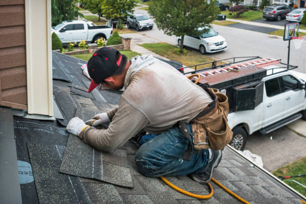 Professional Roofing technician working in North, VA